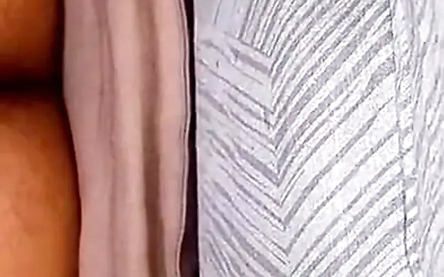 Lustful busty pervert masturbates in a public fitting room
